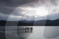 Te Anau jetty with lake and mountain in background, South Island, New Zealand