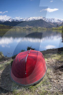 Snow capped mountains reflected in Lake Hayes, Wakatipu Basin in Central Otago, in New Zealand