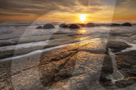 The Moeraki Boulders at sunrise, Moeraki Beach, Otago, New Zealand.