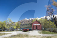 The red boat house in Glenorchy in spring. Queenstown Lakes district, Otago region, South Island, New Zealand