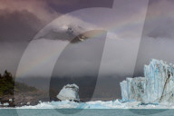 Rainbow and dramatic cloud over Perito Moreno Glacier in Los Glaciares National Park, Patagonia, Argentina,