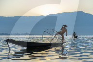 Intha leg rowing fisherman fishing, Inle Lake., Shan State, Myanmar