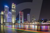 Clarke Quay with boat light trails at night, Singapore