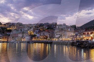 Evening view of Parga restaurants and bars, Preveza, Greece.