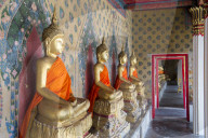 Gold Buddha statues in Wat Arun (The Temple of Dawn), Bangkok, Thailand