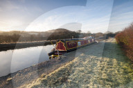 A Canal Barge in Winter with Cloudside in the Distance Congleton, Cheshire