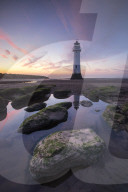 Perch Rock Lighthouse at New Brighton reflected with dramatic sunset, New Brighton, Cheshire