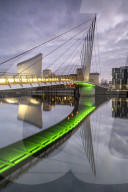 Pedestrian suspension bridge connecting Trafford Promenade with MediaCityUK, Salford Quays, Manchester, UK