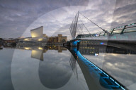 Pedestrian suspension bridge connecting Imperial War Museum North with MediaCityUK, Salford Quays, Manchester, UK
