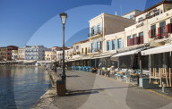 Colourful waterfront cafes beside the Venetian Harbour, Hania, aka Chania, Crete, Greece