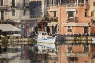 Colourful reflections in the Venetian Harbour, early morning, Rethymno, aka Rethymnon, Crete, Greece