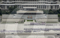 Kim Il Sung Square, hordes of young people rehearsing marching routines prior to a grand parade, Pyongyang, North Korea
