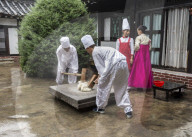 Traditional rice smashing at Kaesong, North Korea