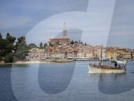 Excursion boat leaving harbour, Rovinj, Istria, Croatia
