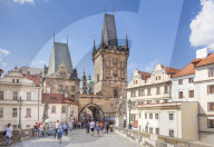 The Lesser Town Bridge Tower of Charles bridge with people visiting the Mala Strana district Prague Czech Republic Europe