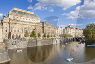 Prague National Theatre, NÃ¡rodnÃ­ divadlo, by the river Vltava with people in boats,Prague, Czech Republic, EU, Europe
