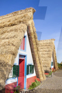 Traditional triangular thatched A-framed Palheiro Houses Santana Madeira Portugal