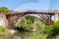 Red Ironbridge bridge over river Severn Ironbridge gorge Iron bridge Shropshire England GB UK europe