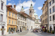 People walking towards Roman Catholic cathedral Ljubljana Cathedral on Cyril Methodius Square Old Town Ljubljana Slovenia Europe