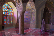 Iran, Fars Province, Shiraz, Nasir al Molk mosque, woman praying