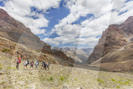 Central Asia, Tajikistan, Fan mountains, trekkers on a mountain trail