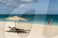 Beach umbrellas on Grace Bay Beach, Providenciales, Turks and Caicos Islands, Caribbean.