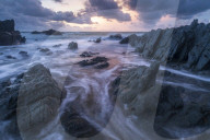 Sunset over the dramatic coastline of North Devon, England. Summer (August) 2018.