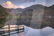 Perfectly still Lake Buttermere at sunset, Lake District National Park, Cumbria, England. Autumn (October) 2018.