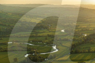 The River Usk meandering through rolling countryside, Brecon Beacons, Powys, Wales, UK. Spring (May) 2019.