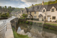 Pretty cottages in the idyllic Cotswolds village of Castle Combe, Wiltshire, England. Spring (May) 2019.