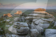 First light on Roughtor at sunrise, Bodmin Moor, Cornwall, England. Spring (June) 2019.