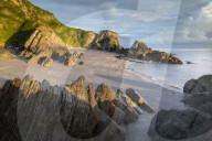 Deserted beach at Lee Bay, North Devon, England. Summer (June) 2019.