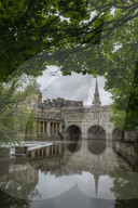 Pulteney Bridge reflected in the River Avon, Bath, Somerset, England. Summer (June) 2019.