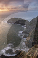 South Stack Lighthouse at sunset, Isle of Anglesey, North Wales, UK. Autumn (September) 2017.