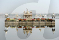 Vijay Raj Rajeshwar temple, in the waters of the Gaibsagar Lake, built in 1923, dedicated to Lord Shiva, Dungarpur, Rajasthan