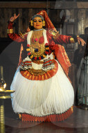 Contemporary female performer in a traditional Kathakali dance about folk mythologies from the Hindu epics, Nilambur, Kerala