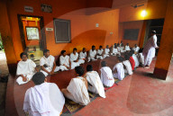 Students at a mantra chanting school in preparation for temple prayer, Puri, Odisha
