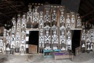 Traditional Naga village house front, decorated with tribal head-hunting icons, Mao Maram, Manipur