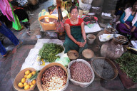 Woman selling vegetables and black rice in Ima women‚Äôs market, Imphal, Manipur