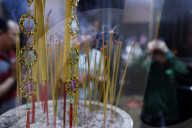 Thien Hung buddhist temple. Close-up of incense sticks burning. Ho Chi Minh City. Vietnam.