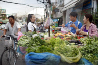 Street market. Fresh vegetables stall. Ho Chi Minh City. Vietnam.