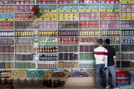 Market stand selling all sorts of local specialties : dried fruits and tea. Dalat. Vietnam.