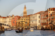 Grand Canal at sunset. Gondolier sailing on gondola. Venice. Italy.