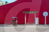 Taxi Brousse Bus stop and a cyclo-pousse in Morondava, Western Madagascar