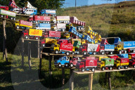 Replica trucks and lorries for sale at a roadside stall on the RN7 near Antsirabe, Central Madagascar