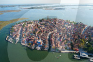 View of Burano island from the helicopter, Venice Lagoon, Italy, Europe
