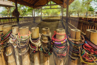 Bracelets left by burial pit in the Killing Fields where 1000s were killed by the Khmer Rouge. Choeung Ek, Phnom Penh, Cambodia