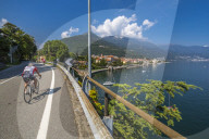 Cyclists on road leading to Cannobio and Lake Maggiore, Lake Maggiore, Piedmont, Italy, Europe