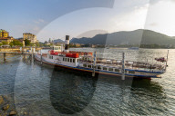 View of tour boat on Lake Como and Duomo visible, Como, Province of Como, Lake Como, Lombardy, Italy, Europe