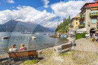 View of visitors on the lakeside in Vezio, Province of Como, Lake Como, Lombardy, Italy, Europe